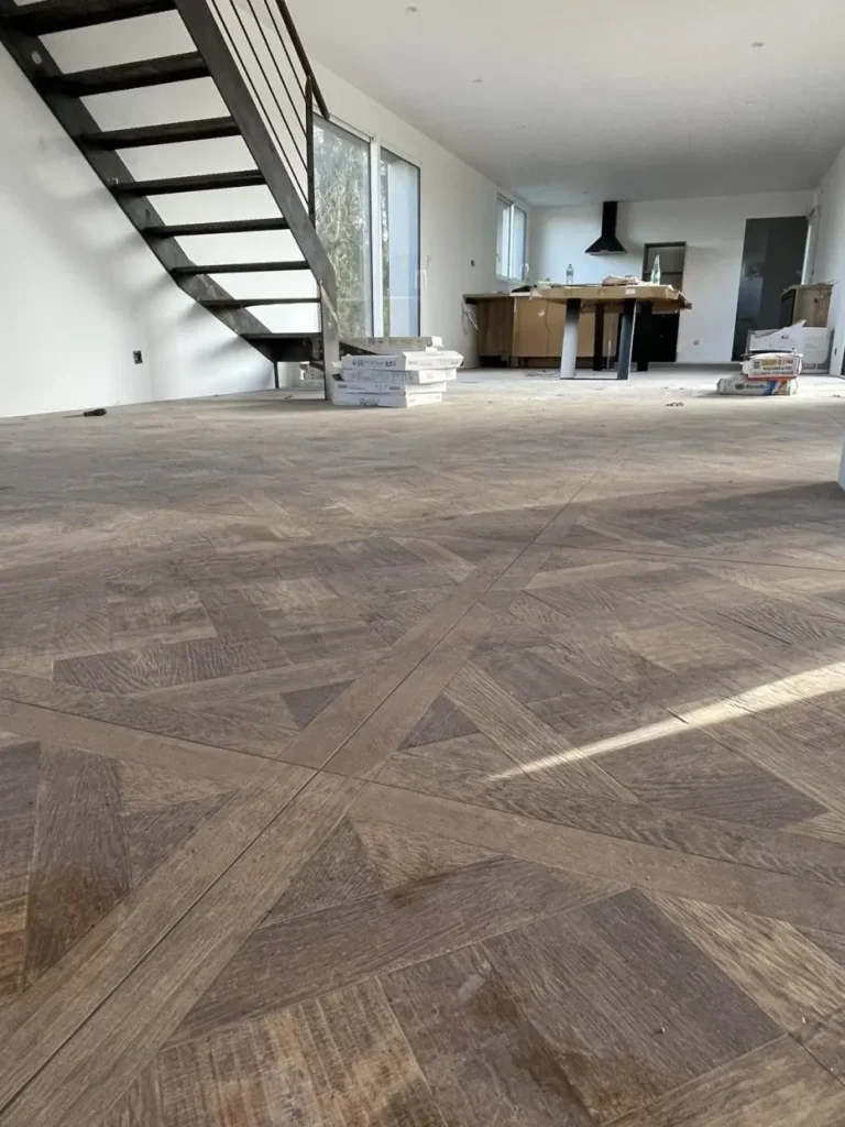 Réalisation de pose de parquet par IDCarré, carreleur à Bouguenais